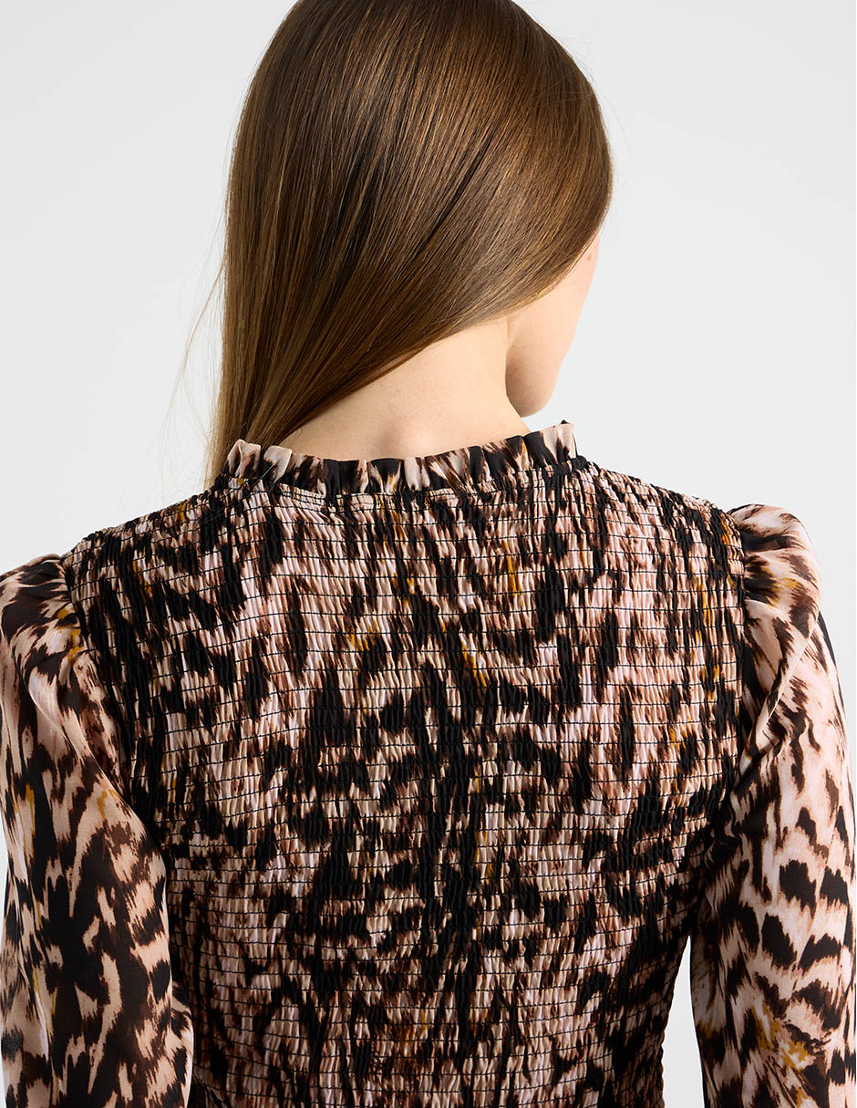 Blusa Metropolis manga larga para mujer