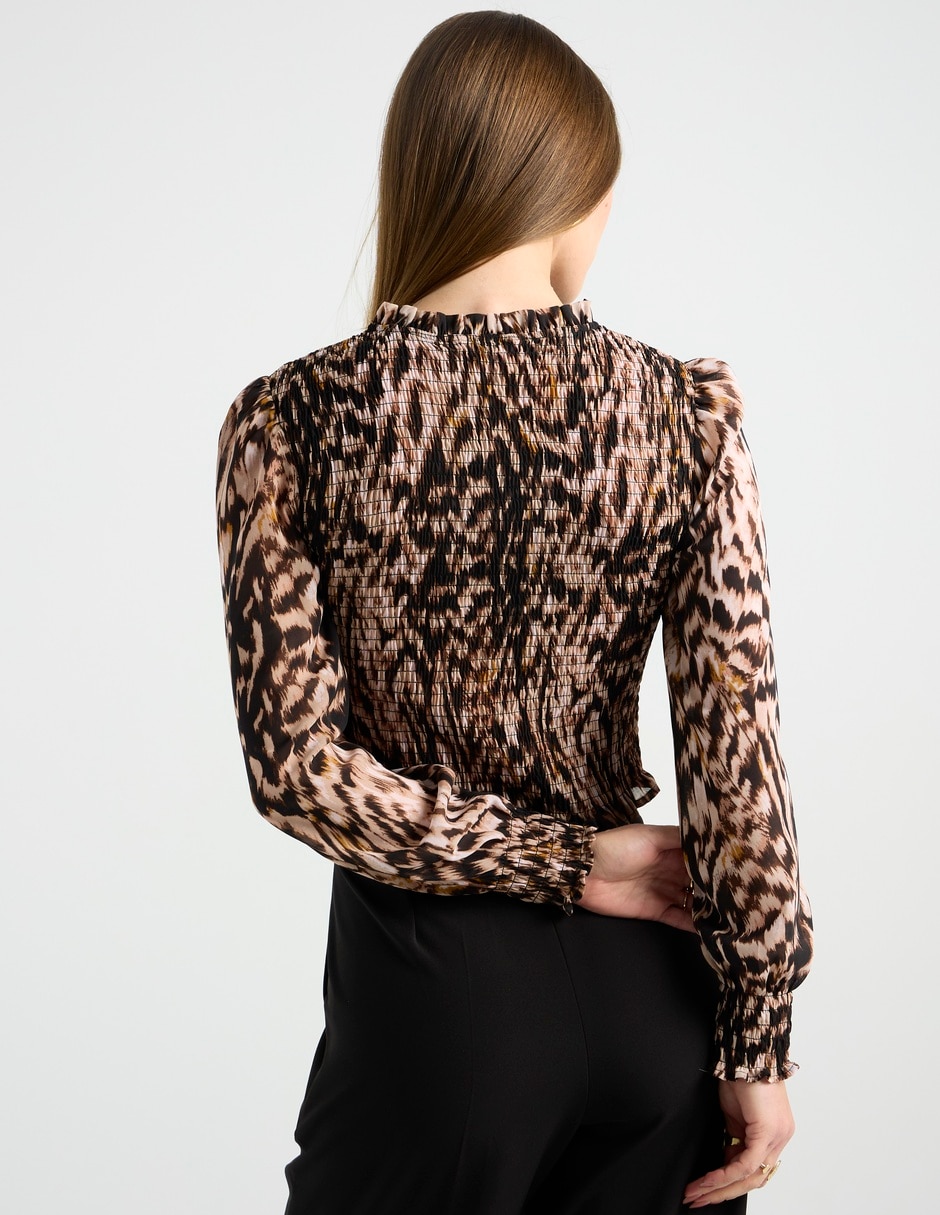 Blusa Metropolis manga larga para mujer